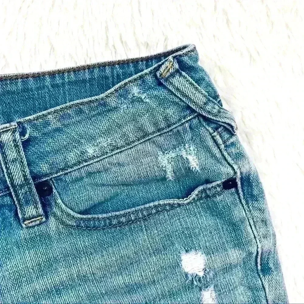 B By‎ Bullhead Med Wash Lowrise Distress Faded Cheeky Raw Hem Jean Shorts Size 9